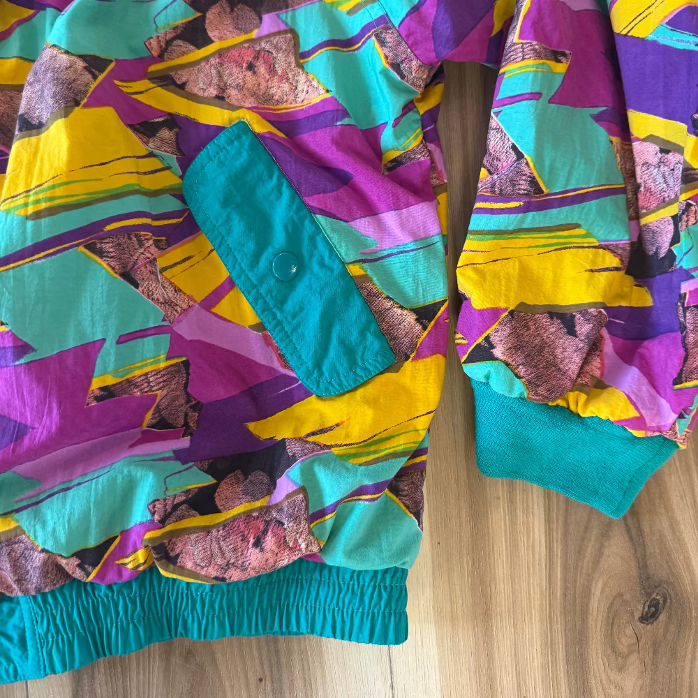 Colorful patterned shirt on a wooden surface